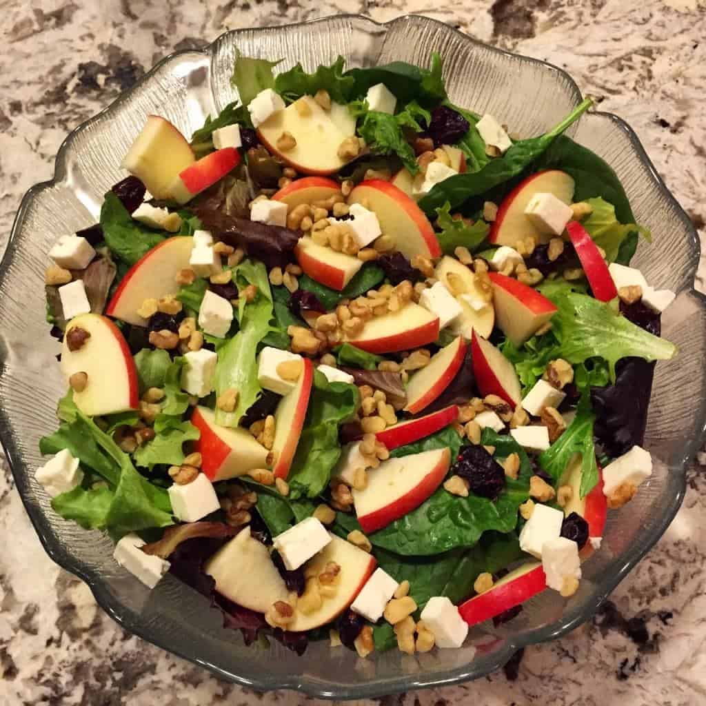 Apple walnut and feta salad in a bowl