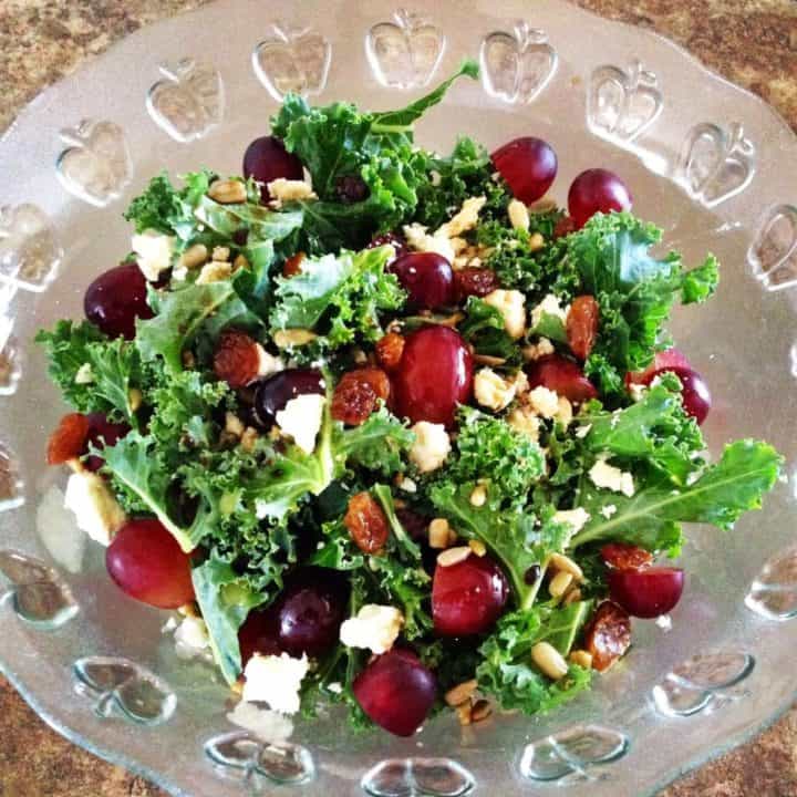 Grape and Feta Kale Salad in a clear bowl