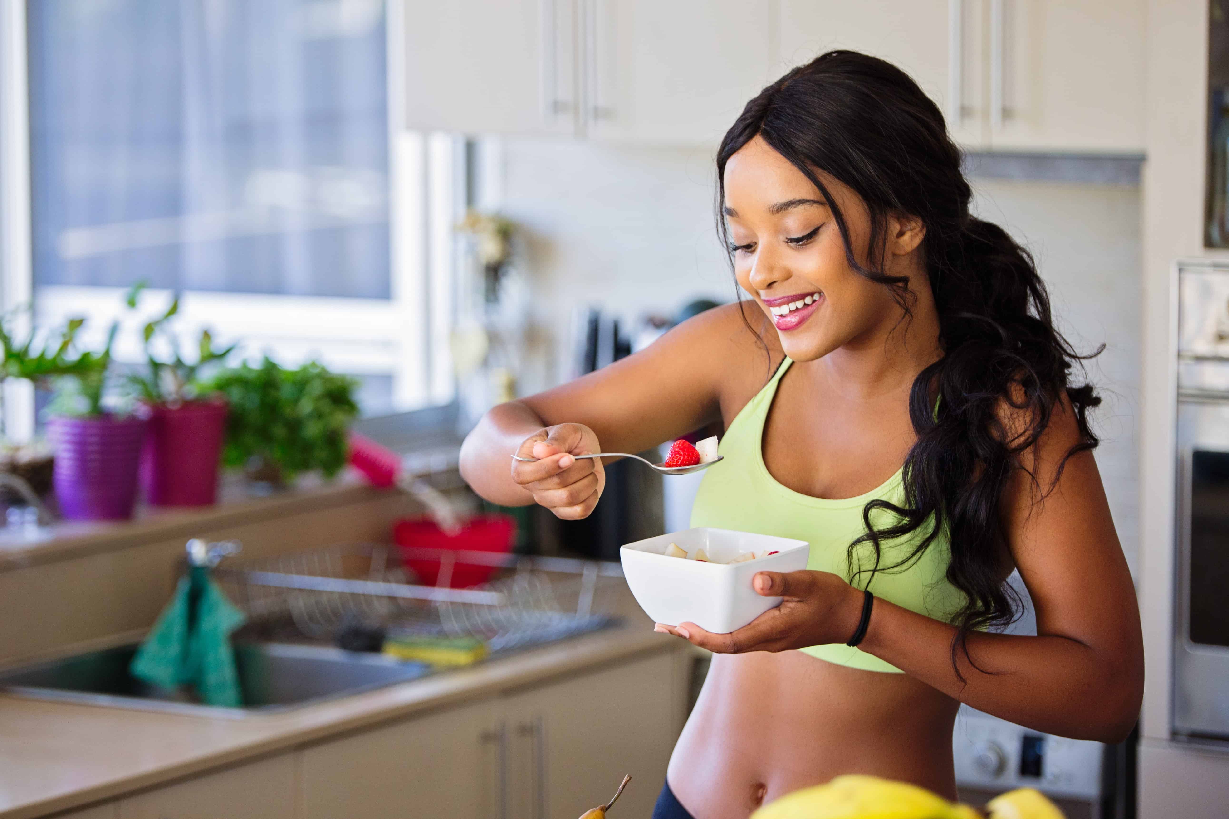 Woman eating Healthy Appetizer