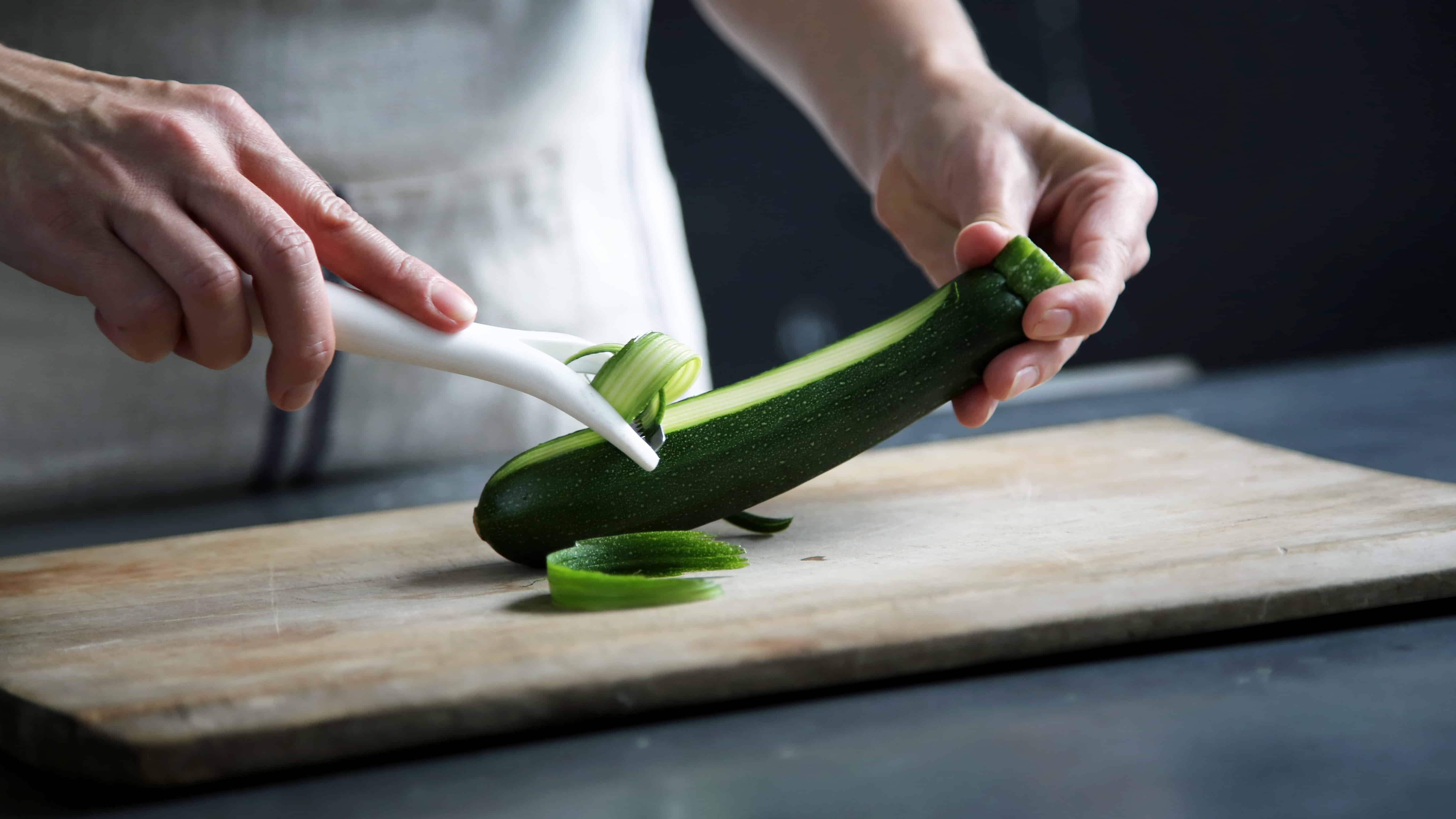 Peeling cucumber food prep 