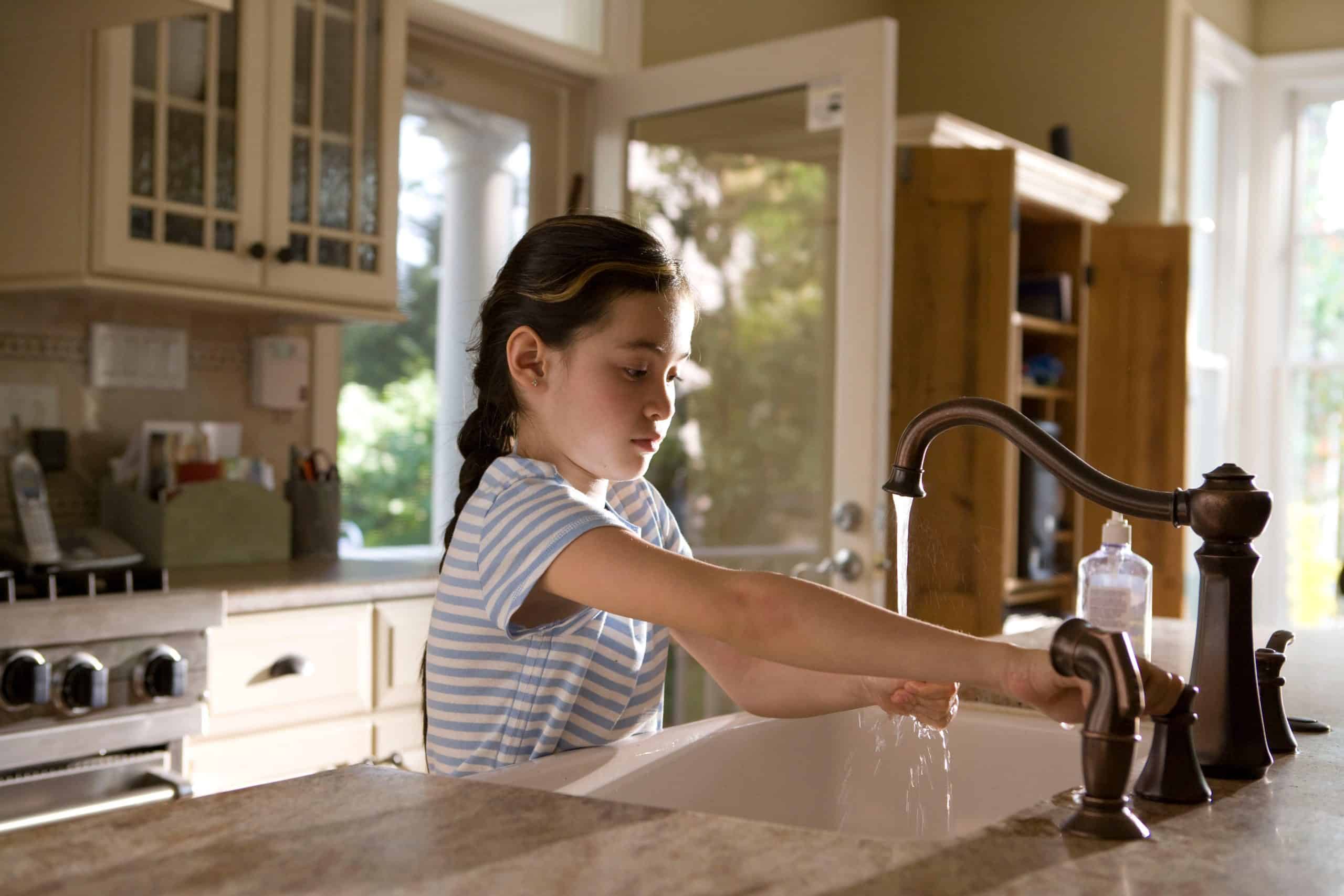 girl on kitchen table prepared for roasting