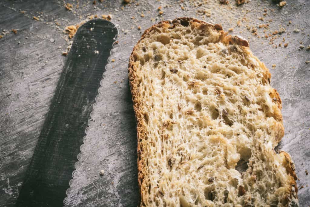 bread and knife; sprouted grain bread