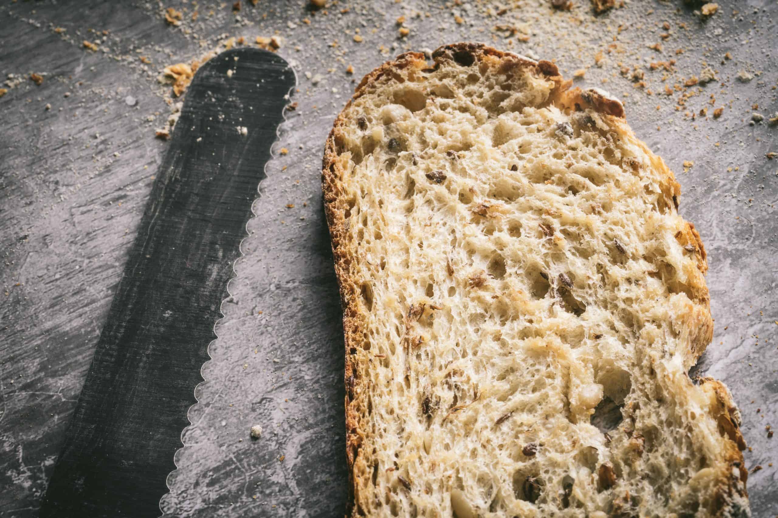 bread and knife; sprouted grain bread