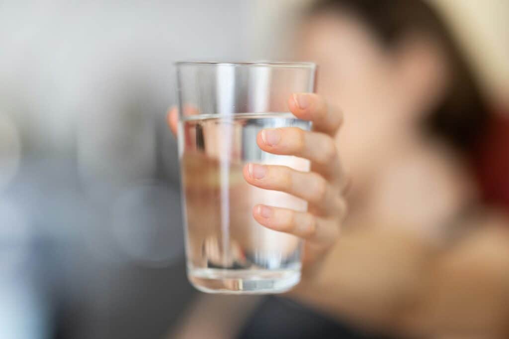Women holding water glass