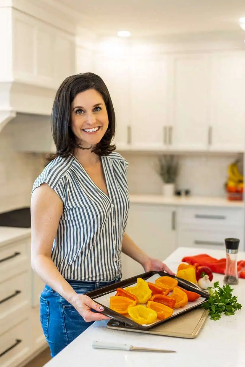 Dietitian Andrea cooking Sausage Stuffed Peppers